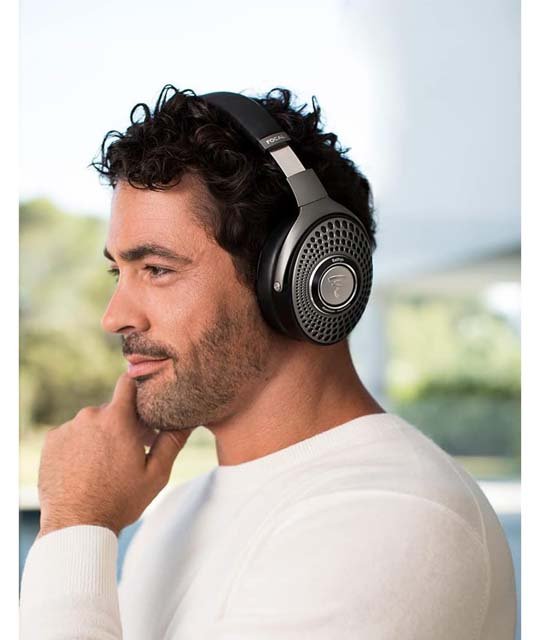 focal bathys headphones on head